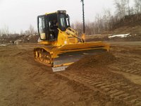 Tracteur Komatsu avec niveau laser PAX